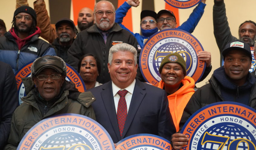 DA Gonzalez at a workers rally