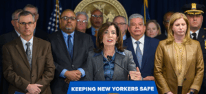 Governor Hochul with NYC DA and police commisioner speaking on Immigrant Rights