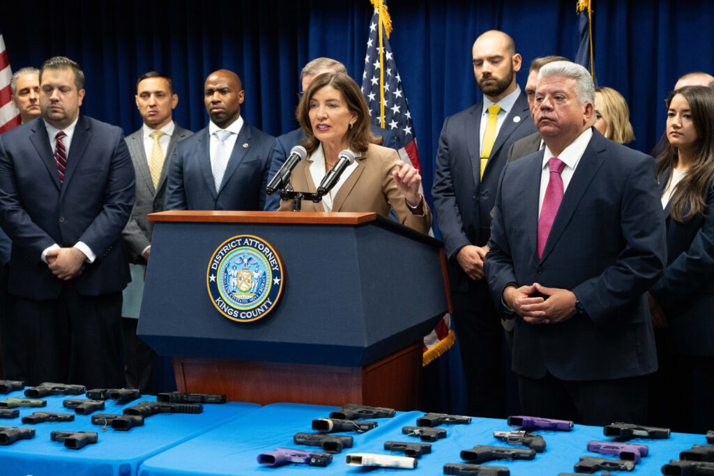 Picture of Governor Kathy Hochul joining Brooklyn District Attorney Eric Gonzalez as he announces a major gang takedown.